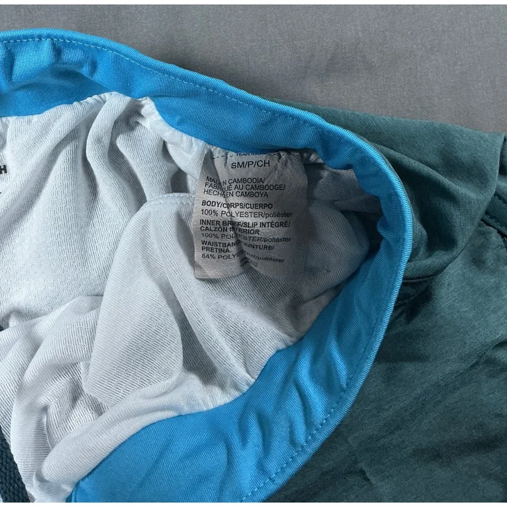 Under Armour Womens Fly By HeatGear Running Shorts Teal Blue Small Loose Fit